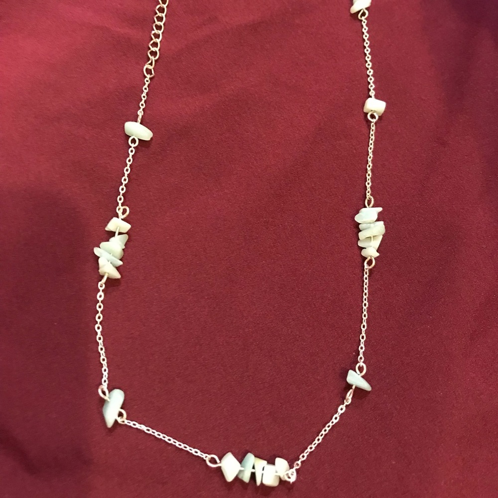 Necklace with blue rock like stones.